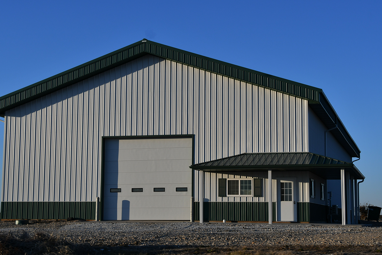Large pole barn with heavy-duty metal siding installed by Urban Shield Roofing in Bloomington, Indiana