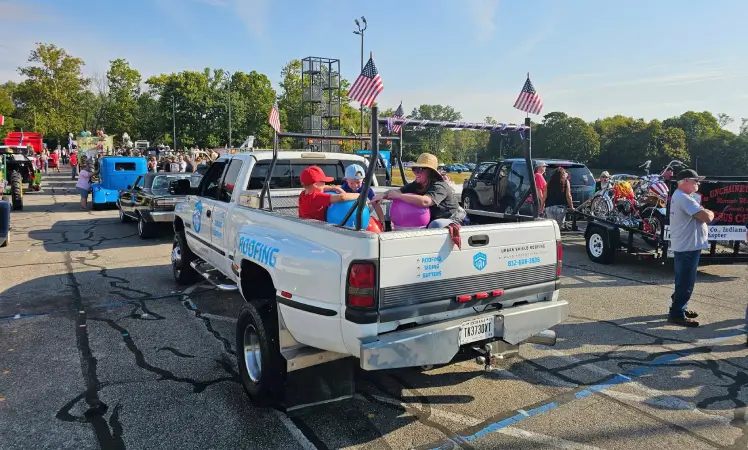Urban Shield Roofing truck in parade Urban Shield Roofing truck in parade