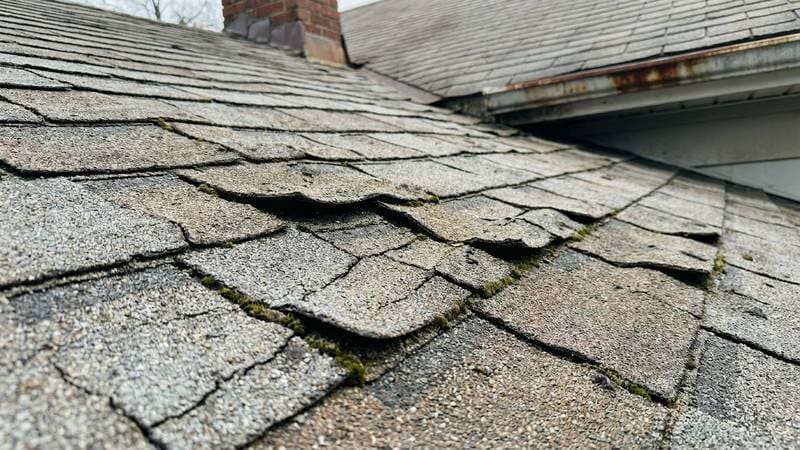 Urban Shield Roofing Cracked Shingles Across Multiple Sections